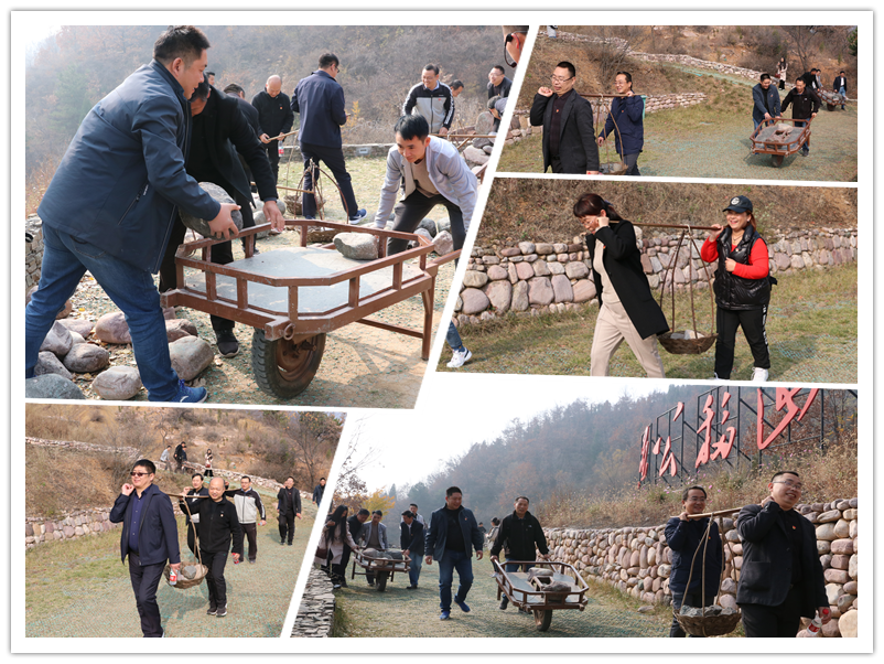 4在愚公移山体验区，学校党员干部或推上小车，或扛起扁担，身体力行担山运石，切身体验愚公移山的艰辛和不辍精神.png